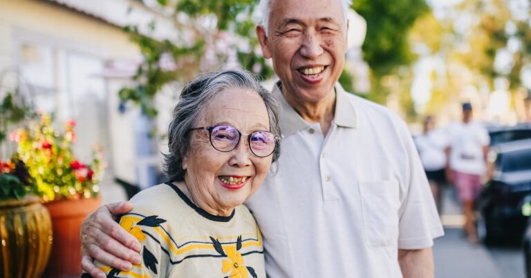 Happy senior couple outside a retirement home in Ottawa